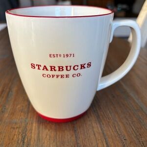 Starbucks 2007 18 ounce ceramic cup with red lettering and red trim